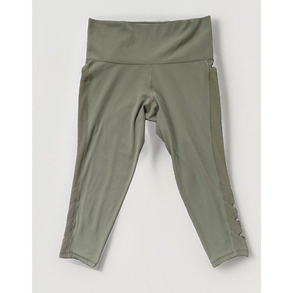 Athleta Salutation Stash Pocket II Cutout 7/8 Leggings 1X Green Olive Cutout